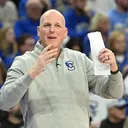 All Aboard the Huss Bus: Alan Huss Rides Again at Creighton